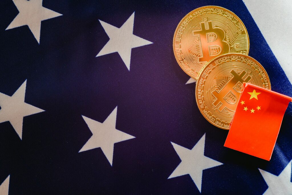 China uses bitcoins to win trade war to the United States, Chinese and American flags together.